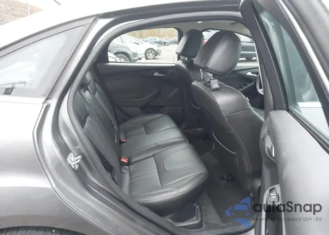 2014 Ford Focus Titanium из США, поврежденный, VIN 1FADP3J25EL297552